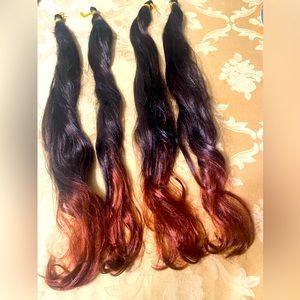 Two tones 4 pieces synthetic tangle free hair for braiding or pony tails .